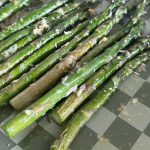 Oven-roasted garlic parmesan asparagus on a baking sheet – easy healthy side dish