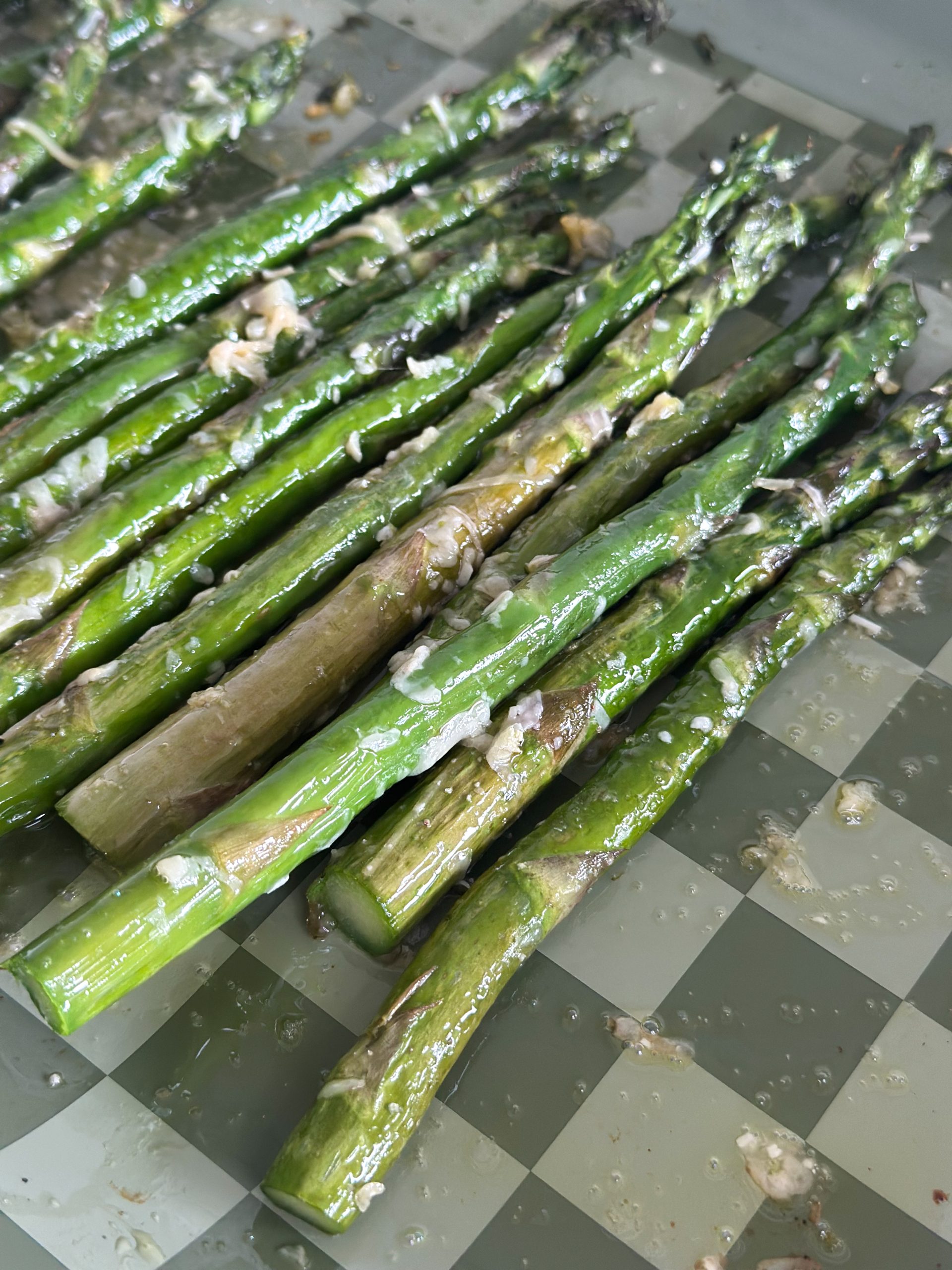 Oven-roasted garlic parmesan asparagus on a baking sheet – easy healthy side dish